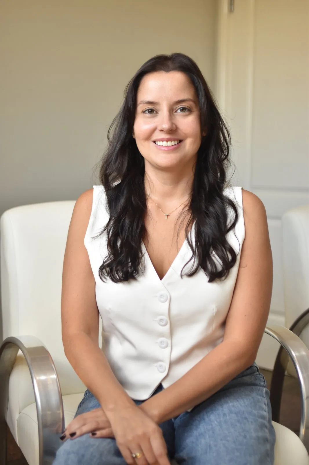 Dra. Taís Vital sorrindo